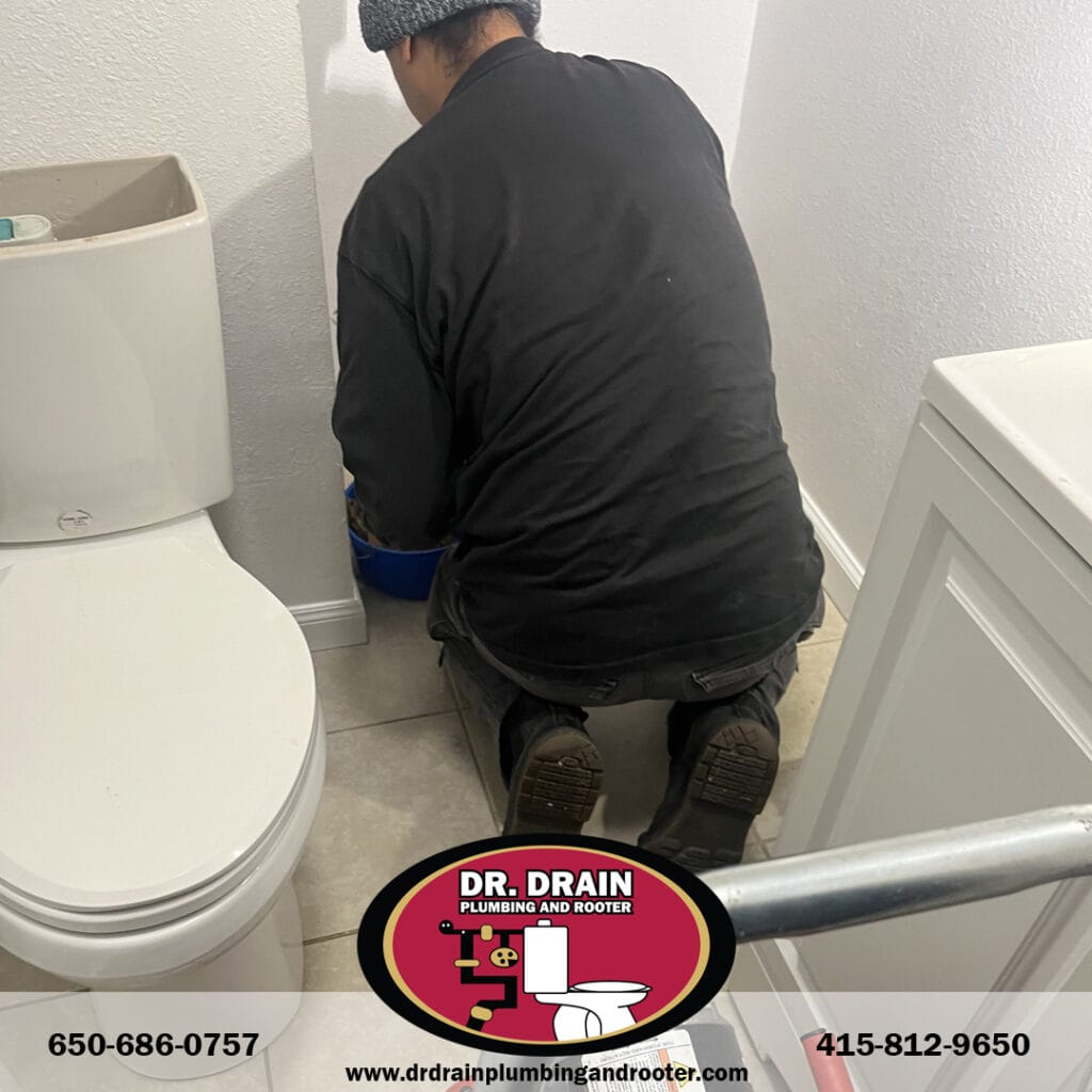Installation of low-flow showerhead and water-saving fixtures in San Francisco home during drought season